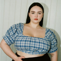 Kenna is wearing the 2X in the sold out blue plaid version