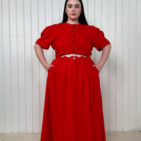 Kenna is wearing the 2X sold out red version