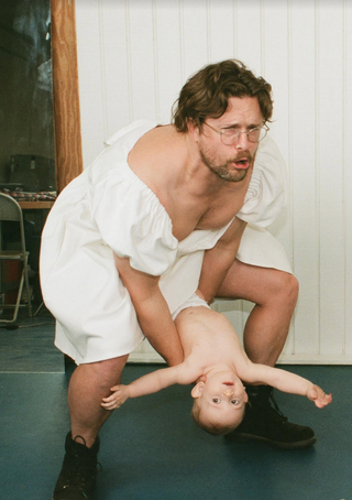 Max is wearing the XL