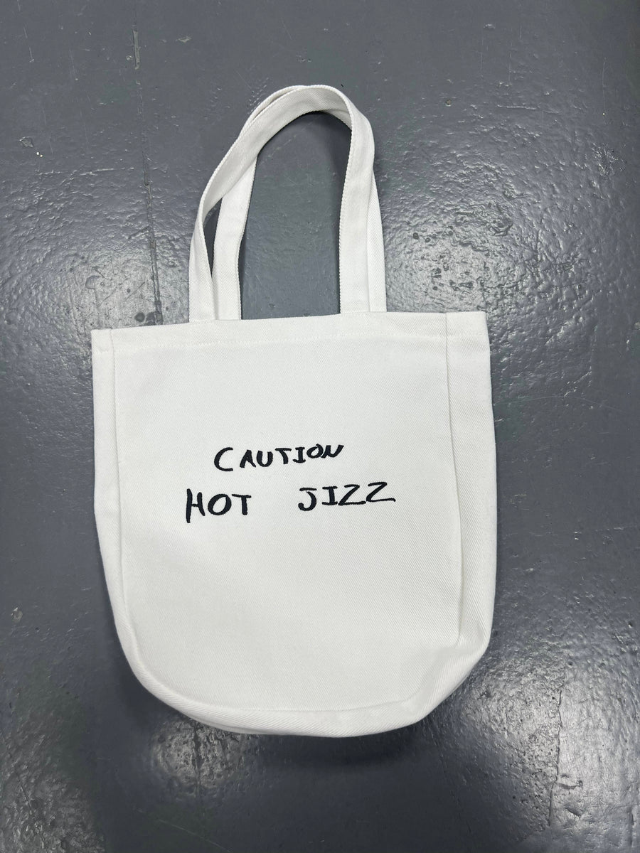 CAUTION tote bag