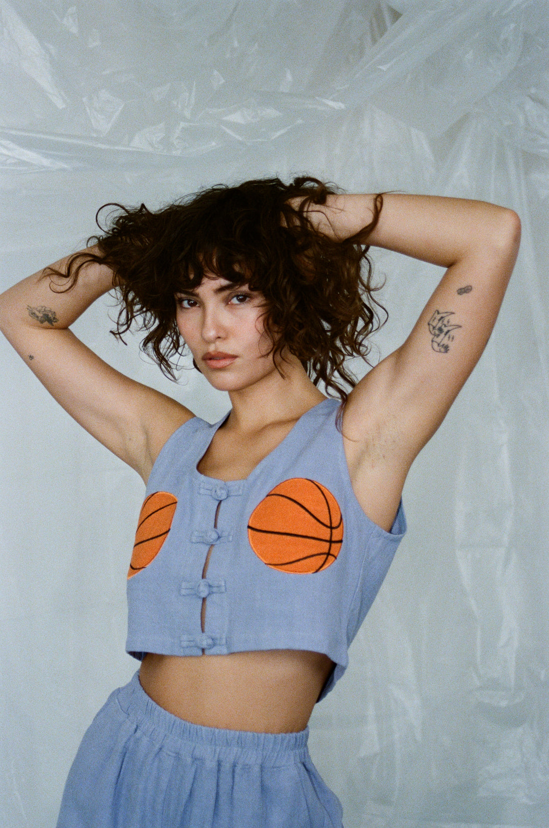 Sydney is wearing XS/S