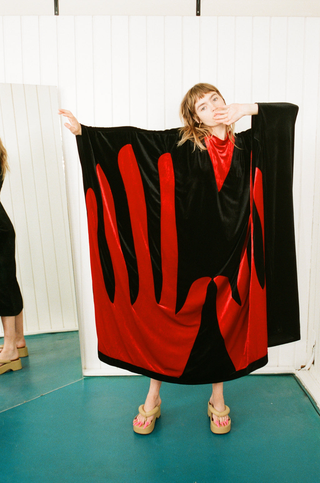 Manos Cloak Fashion Brand Company