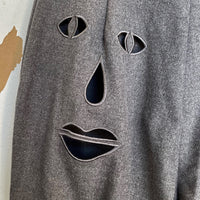 Face cut out Gray Trousers